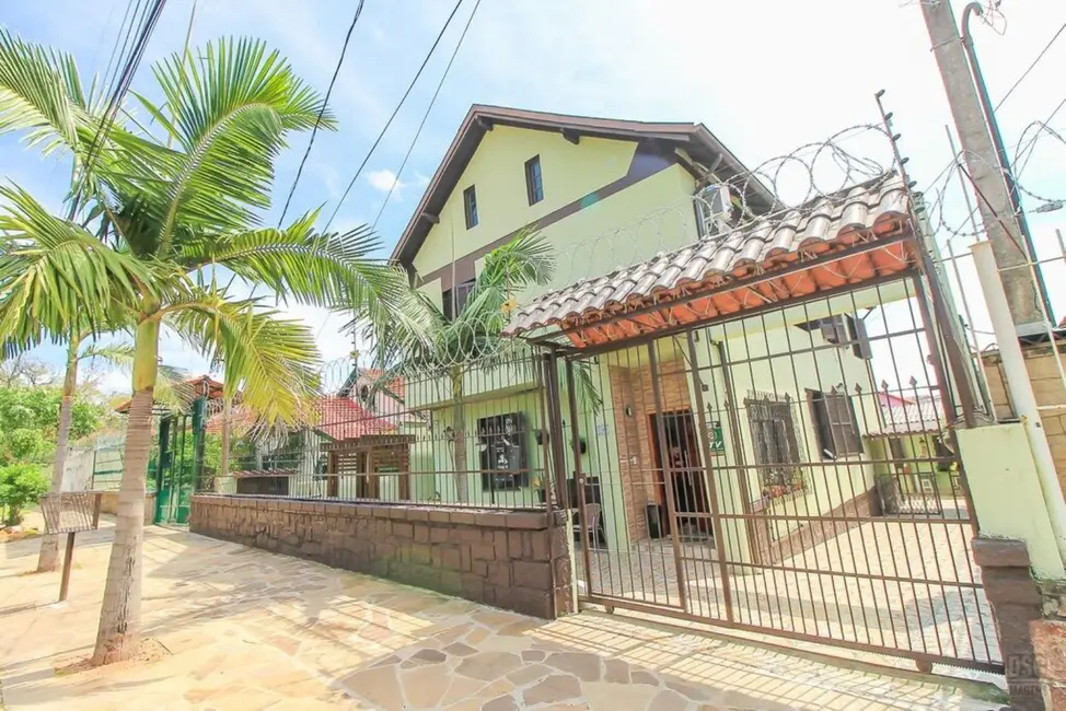 Foto 2 de Casa com 11 quartos à venda, 338m2 em Santa Tereza, Porto Alegre - RS
