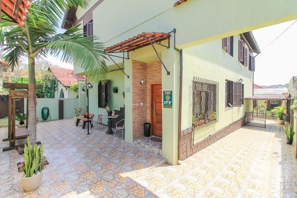 Foto 1 de Casa com 11 quartos à venda, 338m2 em Santa Tereza, Porto Alegre - RS