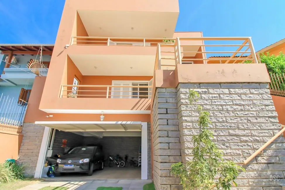 Casa com 3 quartos à venda, 265m2 em Espírito Santo, Porto Alegre - RS - imagem 4 Foto 4 de Casa com 3 quartos à venda, 265m2 em Espírito Santo, Porto Alegre - RS