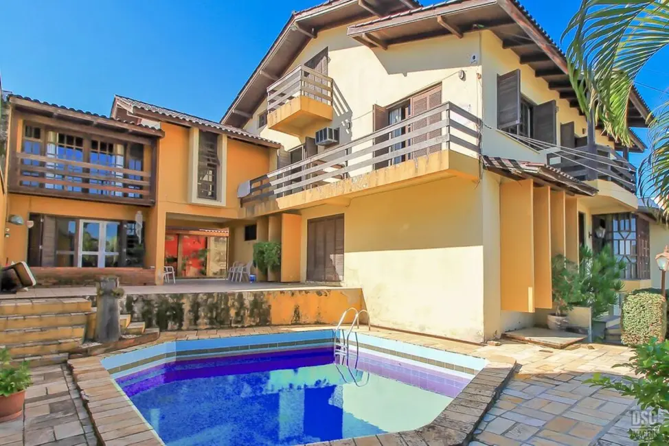 Foto 6 de Casa com 5 quartos à venda, 674m2 em Ipanema, Porto Alegre - RS