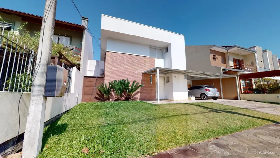 Foto 2 de Casa com 3 quartos à venda, 231m2 em Campo Novo, Porto Alegre - RS