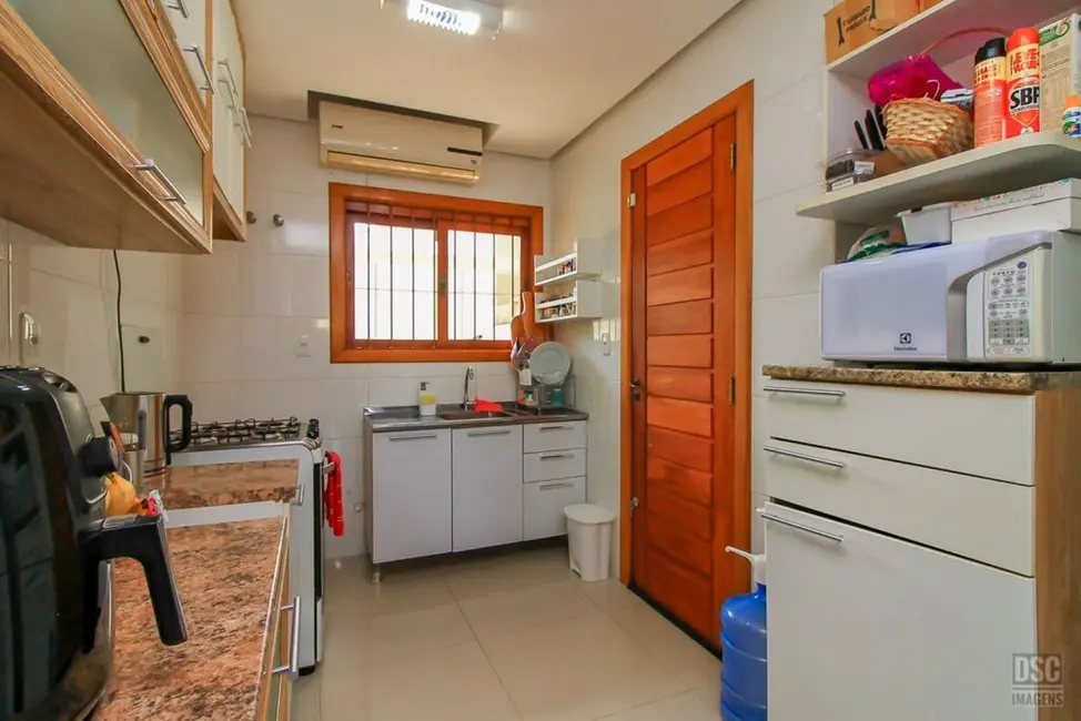 Foto 9 de Casa com 3 quartos à venda, 129m2 em Guarujá, Porto Alegre - RS