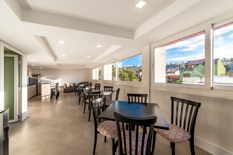 Apartamento com 2 quartos à venda, 58m2 em Santo Antônio, Porto Alegre - RS - imagem 8 Foto 8 de Apartamento com 2 quartos à venda, 58m2 em Santo Antônio, Porto Alegre - RS