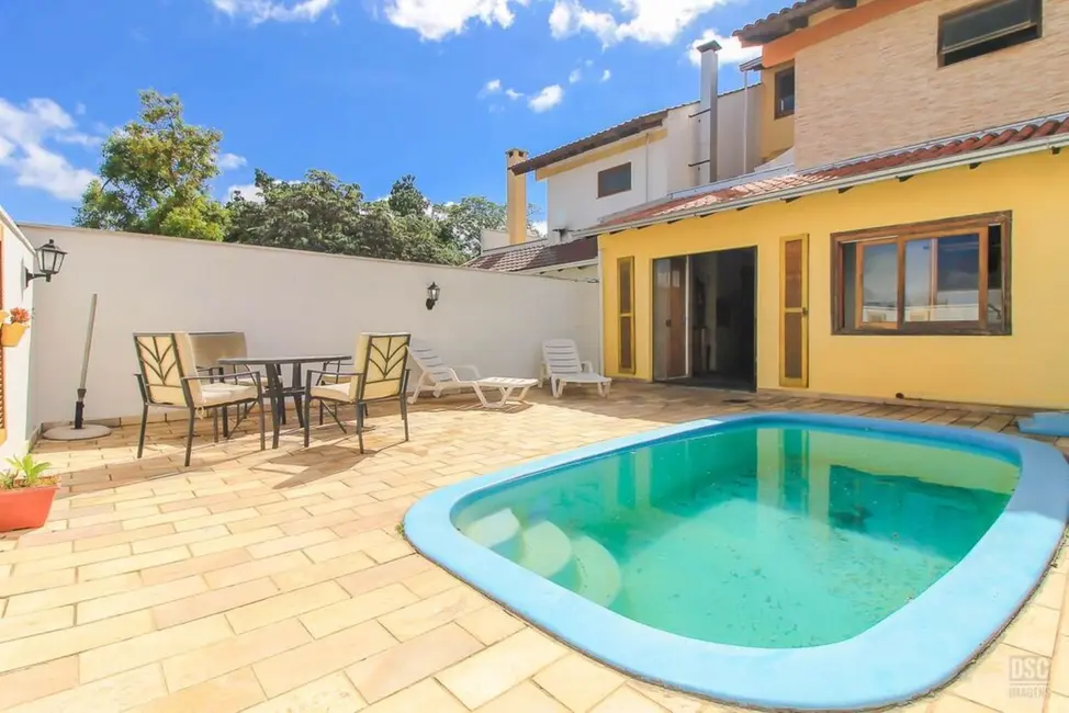 Foto 1 de Casa com 4 quartos à venda, 188m2 em Espírito Santo, Porto Alegre - RS