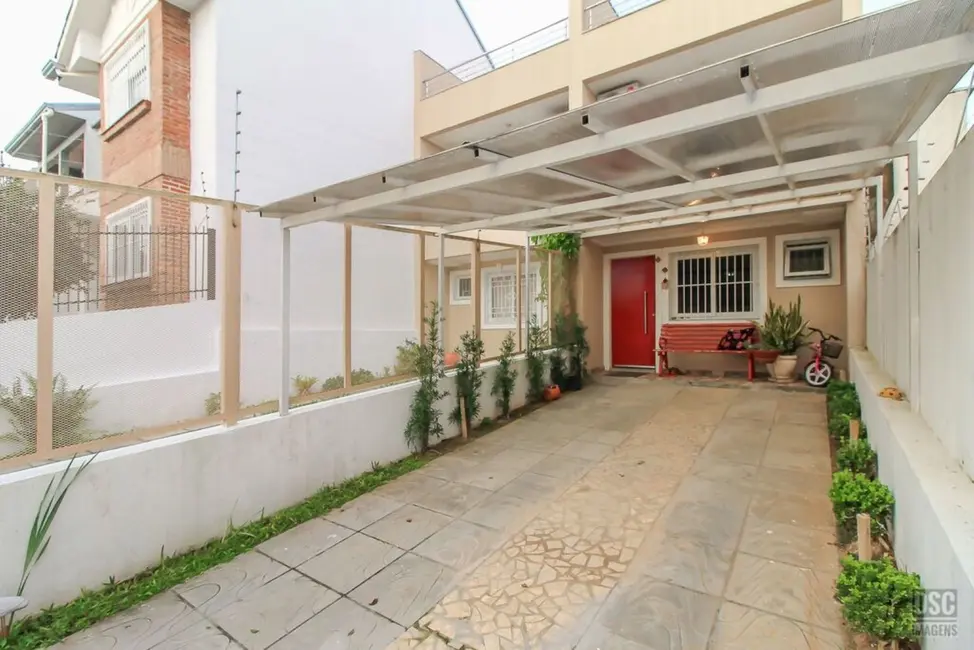 Foto 3 de Casa com 3 quartos à venda, 120m2 em Guarujá, Porto Alegre - RS