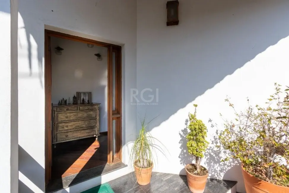 Foto 4 de Casa com 4 quartos à venda, 452m2 em Cavalhada, Porto Alegre - RS