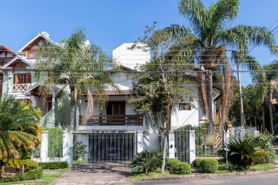 Foto 1 de Casa com 4 quartos à venda, 452m2 em Cavalhada, Porto Alegre - RS