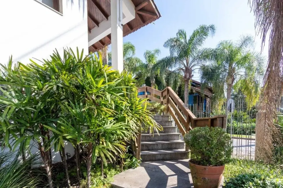 Foto 3 de Casa com 4 quartos à venda, 452m2 em Cavalhada, Porto Alegre - RS