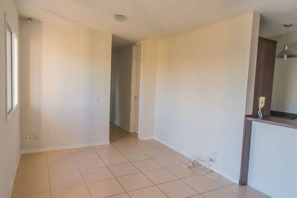 Foto 4 de Apartamento com 3 quartos à venda, 69m2 em Humaitá, Porto Alegre - RS
