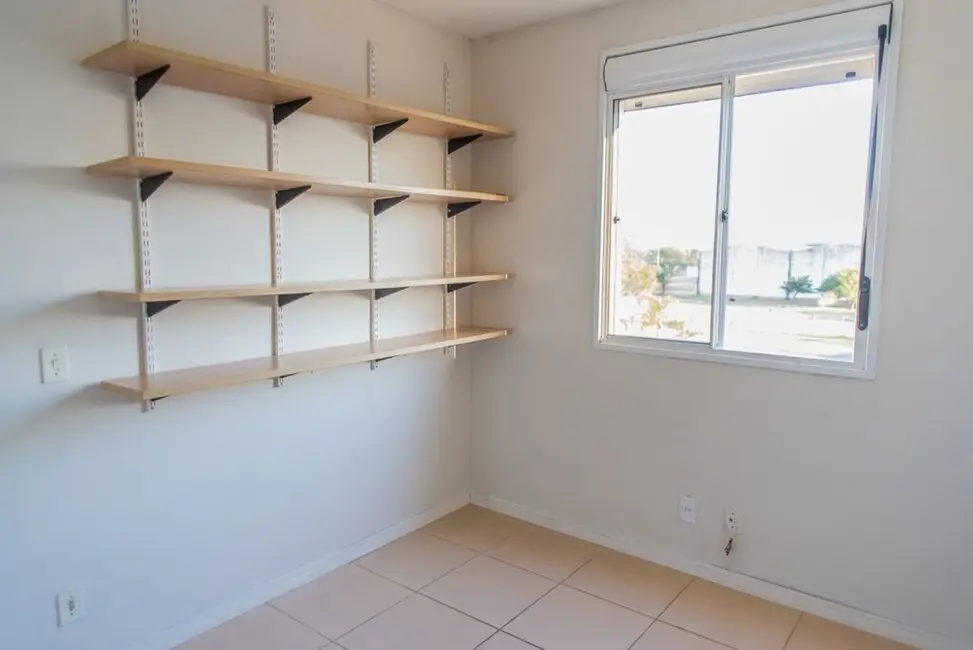 Foto 8 de Apartamento com 3 quartos à venda, 69m2 em Humaitá, Porto Alegre - RS