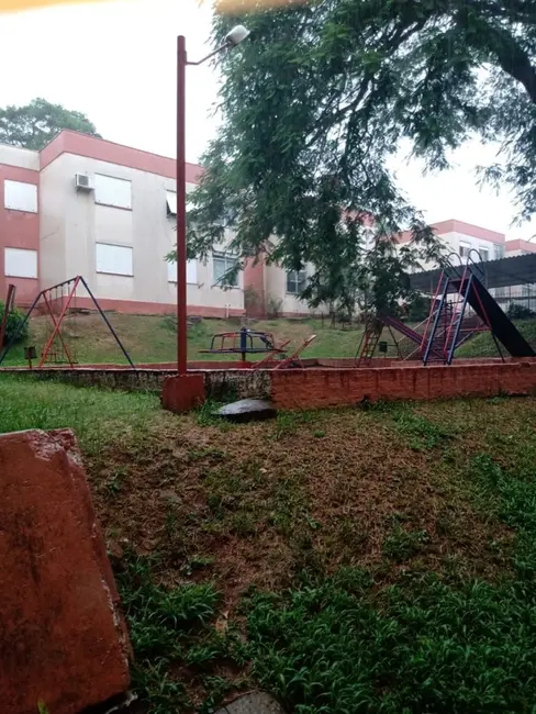 Foto 2 de Apartamento com 2 quartos à venda, 49m2 em Santa Tereza, Porto Alegre - RS