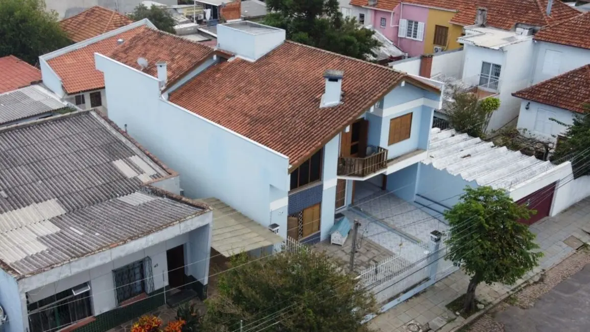 Foto 2 de Casa com 4 quartos à venda, 351m2 em Glória, Porto Alegre - RS