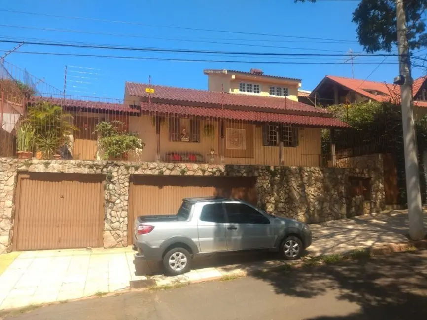 Foto 3 de Casa com 4 quartos à venda, 251m2 em Santa Tereza, Porto Alegre - RS