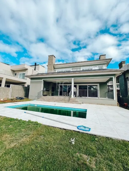 Foto 9 de Casa de Condomínio com 4 quartos à venda, 356m2 em Vila Nova, Porto Alegre - RS