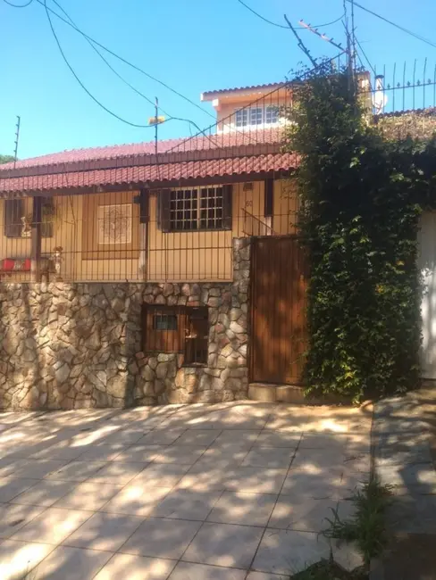 Foto 2 de Casa com 3 quartos à venda, 240m2 em Santa Tereza, Porto Alegre - RS