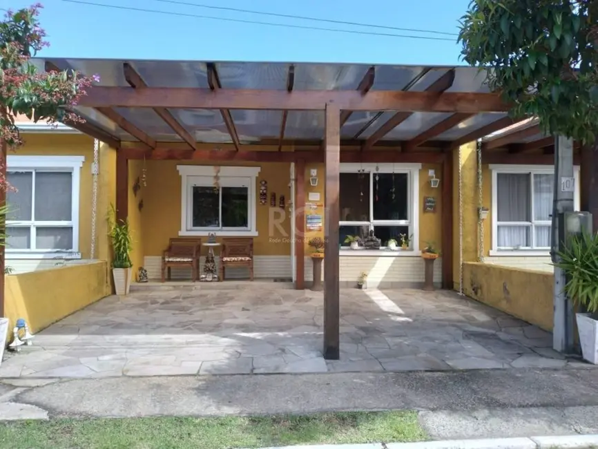 Casa de Condomínio com 3 quartos à venda, 71m2 em Hípica, Porto Alegre - RS - imagem 1 Foto 1 de Casa de Condomínio com 3 quartos à venda, 71m2 em Hípica, Porto Alegre - RS