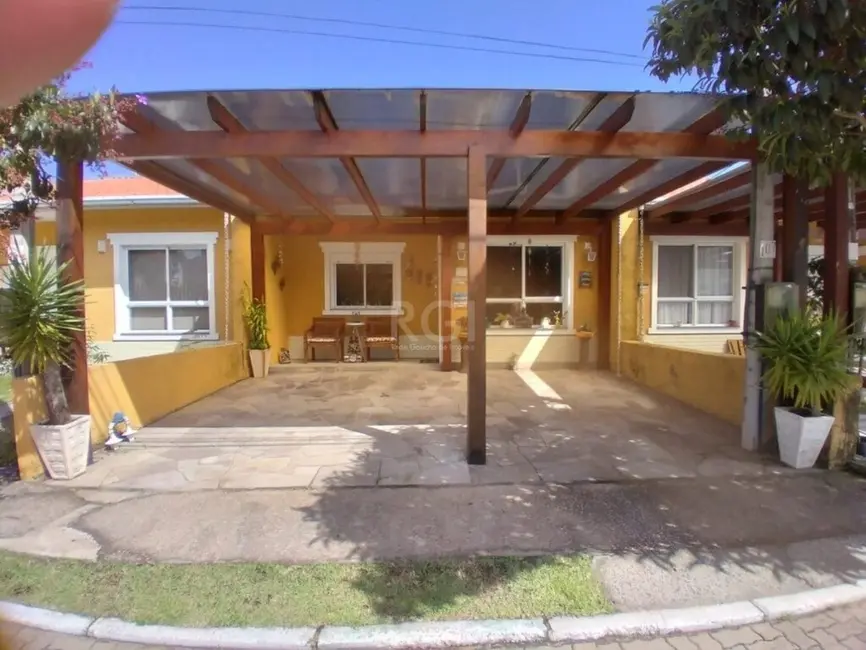 Casa de Condomínio com 3 quartos à venda, 71m2 em Hípica, Porto Alegre - RS - imagem 2 Foto 2 de Casa de Condomínio com 3 quartos à venda, 71m2 em Hípica, Porto Alegre - RS