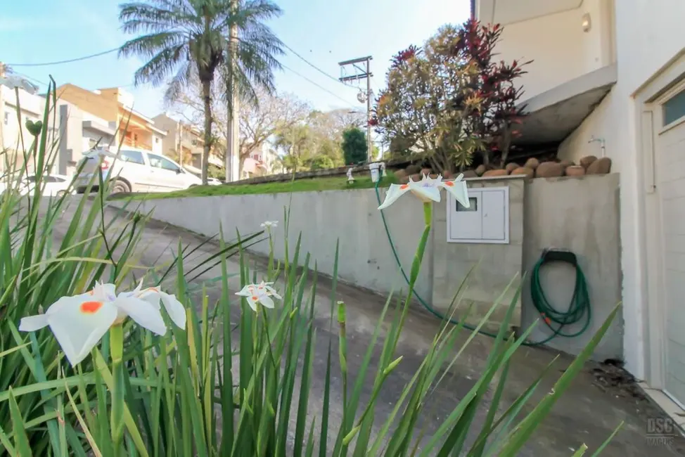 Foto 4 de Casa de Condomínio com 3 quartos à venda, 205m2 em Vila Nova, Porto Alegre - RS