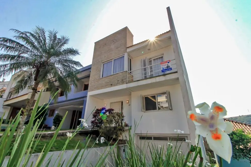 Foto 3 de Casa de Condomínio com 3 quartos à venda, 205m2 em Vila Nova, Porto Alegre - RS