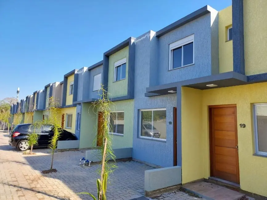 Foto 3 de Casa de Condomínio com 2 quartos à venda, 64m2 em Vila Nova, Porto Alegre - RS