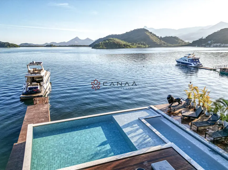 Casa de Condomínio com 6 quartos para alugar, 1000m2 em Itanema (Cunhambebe), Angra Dos Reis - RJ - imagem 1 Foto 1 de Casa de Condomínio com 6 quartos para alugar, 1000m2 em Itanema (Cunhambebe), Angra Dos Reis - RJ