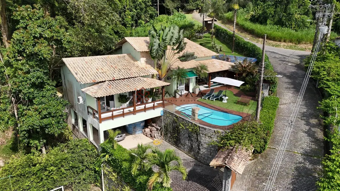 Foto 1 de Casa de Condomínio com 4 quartos para alugar, 260m2 em Portogalo, Angra Dos Reis - RJ