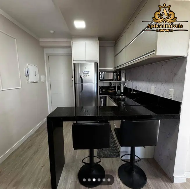 Foto 3 de Apartamento com 2 quartos à venda, 56m2 em Centro, Navegantes - SC
