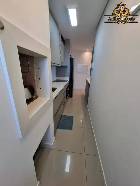 Foto 4 de Apartamento com 2 quartos à venda, 62m2 em Centro, Navegantes - SC