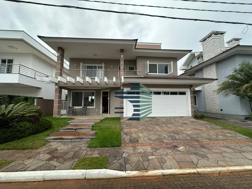 Foto 1 de Casa de Condomínio com 4 quartos à venda e para alugar, 500m2 em Marechal Rondon, Canoas - RS