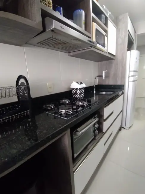 Foto 8 de Apartamento com 2 quartos à venda, 63m2 em Bombinhas - SC