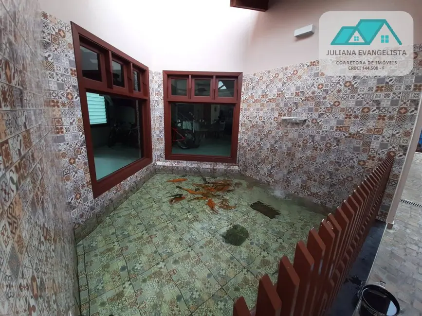 Foto 7 de Casa com 4 quartos à venda, 450m2 em Indaiá, Caraguatatuba - SP