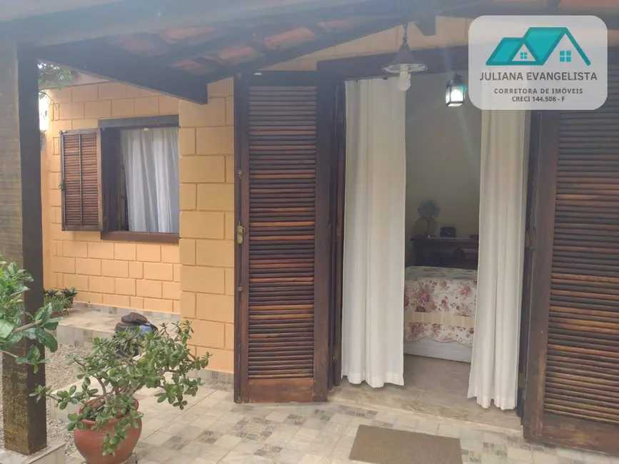 Foto 2 de Casa com 3 quartos à venda em Cidade Jardim, Caraguatatuba - SP