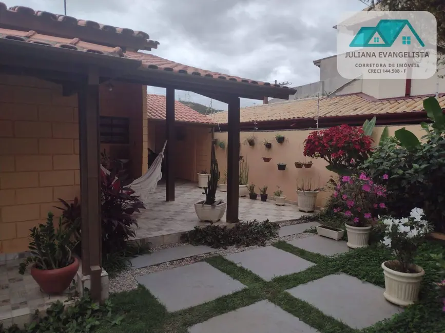 Foto 3 de Casa com 3 quartos à venda em Cidade Jardim, Caraguatatuba - SP