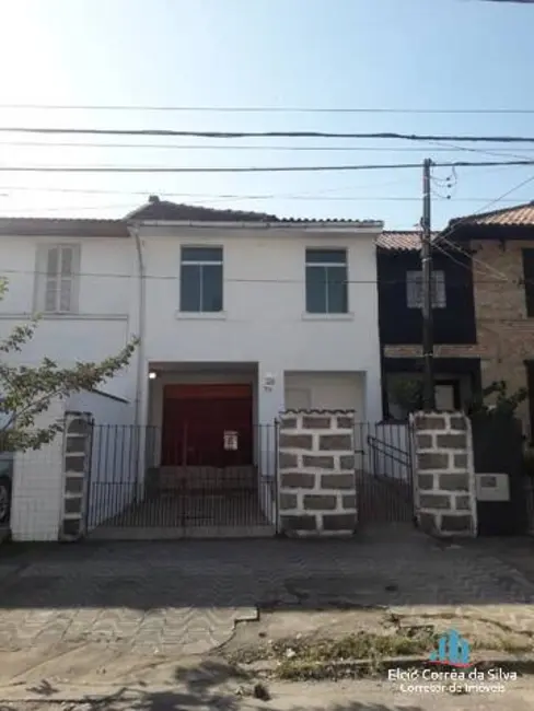Foto 1 de Casa com 5 quartos para alugar, 335m2 em Vila Mathias, Santos - SP