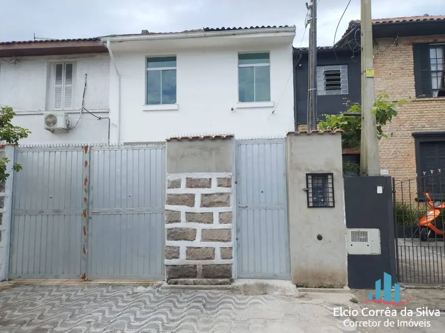 Foto 1 de Casa com 5 quartos para alugar, 335m2 em Vila Mathias, Santos - SP