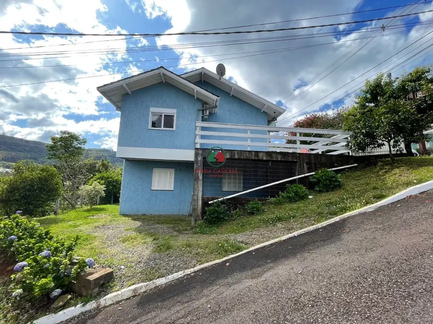 Foto 2 de Casa com 4 quartos à venda, 200m2 em Várzea Grande, Gramado - RS