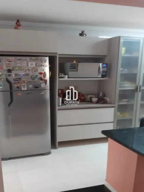 Casa com 2 quartos à venda, 103m2 em Gonzaga, Santos - SP - imagem 5 Foto 5 de Casa com 2 quartos à venda, 103m2 em Gonzaga, Santos - SP