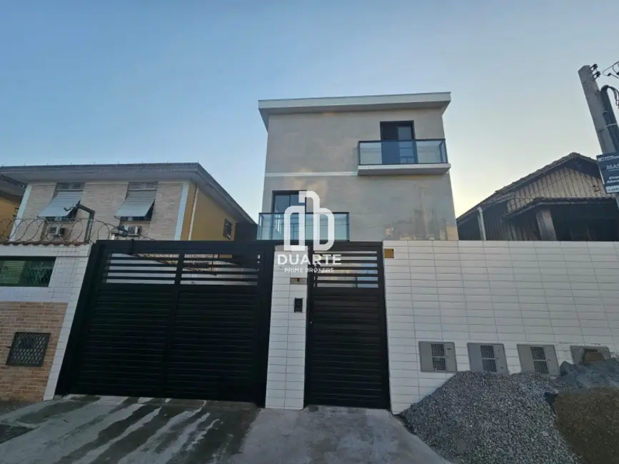 Foto 1 de Casa com 2 quartos à venda, 95m2 em Macuco, Santos - SP