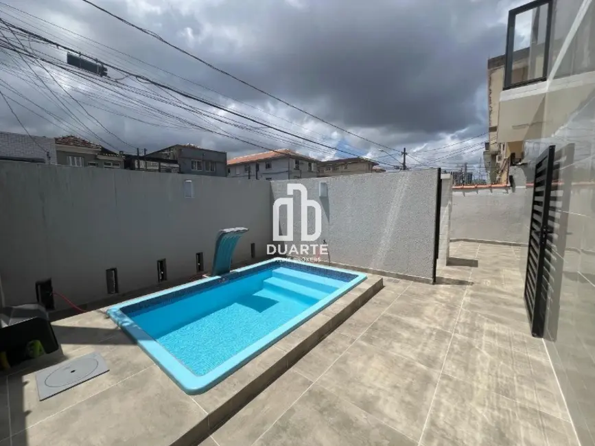 Foto 1 de Casa com 2 quartos à venda, 95m2 em Macuco, Santos - SP