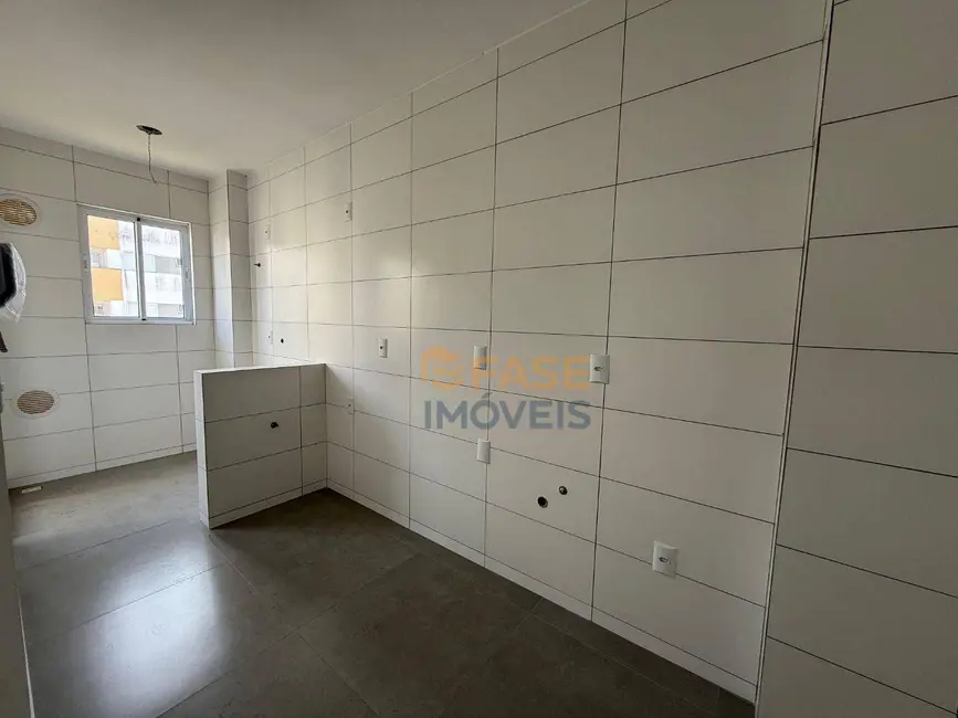Foto 2 de Apartamento com 2 quartos à venda, 63m2 em Pinheirinho, Criciuma - SC