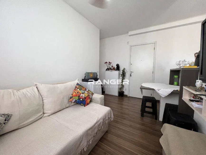 Foto 1 de Apartamento com 2 quartos à venda, 65m2 em Areia Branca, Santos - SP