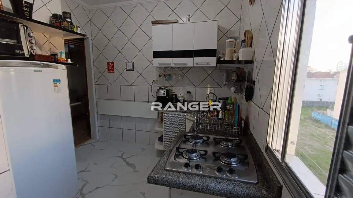 Foto 6 de Apartamento com 2 quartos à venda, 59m2 em Embaré, Santos - SP