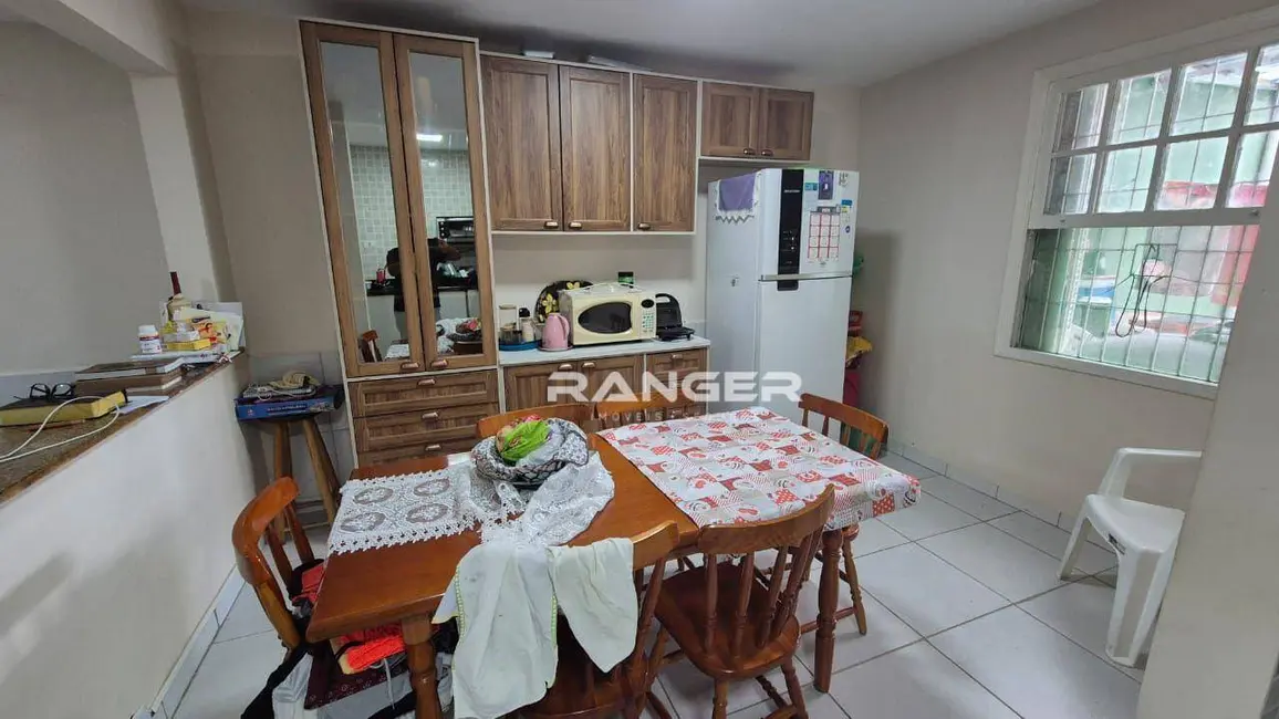 Casa de Condomínio com 2 quartos à venda, 117m2 em Encruzilhada, Santos - SP - imagem 3 Foto 3 de Casa de Condomínio com 2 quartos à venda, 117m2 em Encruzilhada, Santos - SP