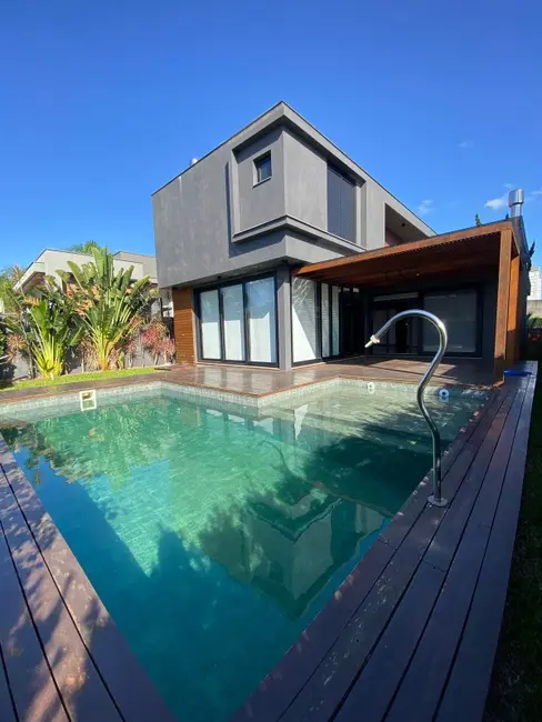 Casa de Condomínio com 3 quartos à venda, 240m2 em Gravatai - RS - imagem 1 Foto 1 de Casa de Condomínio com 3 quartos à venda, 240m2 em Gravatai - RS