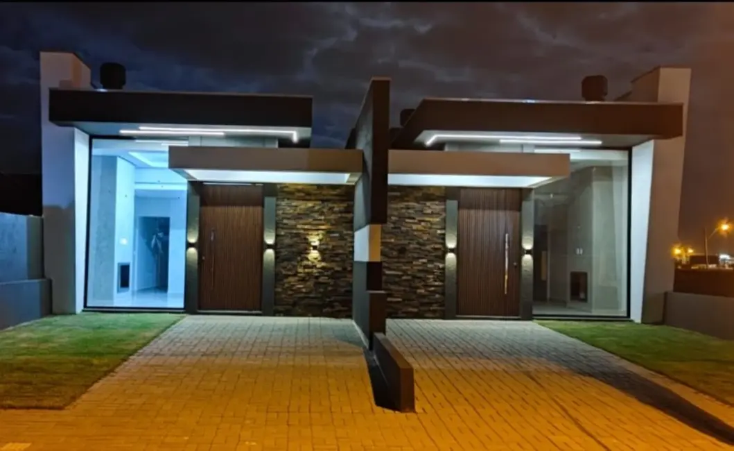 Casa com 3 quartos à venda, 88m2 em Capao Da Canoa - RS - imagem 1 Foto 1 de Casa com 3 quartos à venda, 88m2 em Capao Da Canoa - RS