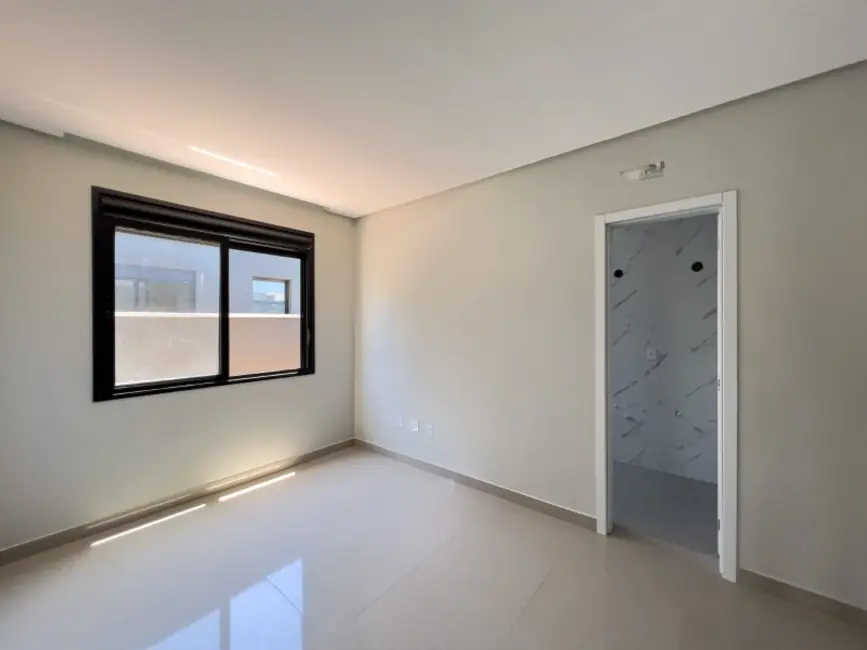 Casa com 3 quartos à venda, 88m2 em Capao Da Canoa - RS - imagem 5 Foto 5 de Casa com 3 quartos à venda, 88m2 em Capao Da Canoa - RS