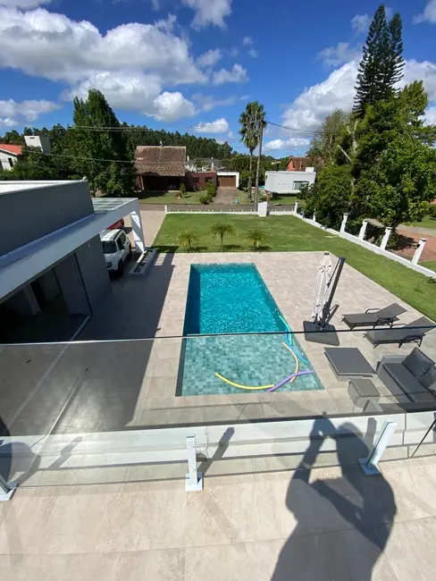 Foto 1 de Casa de Condomínio com 3 quartos à venda, 385m2 em Morada Gaúcha, Gravatai - RS