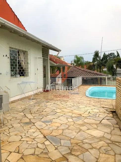 Casa com 3 quartos à venda, 147m2 em Dom Feliciano, Gravatai - RS - imagem 6 Foto 6 de Casa com 3 quartos à venda, 147m2 em Dom Feliciano, Gravatai - RS