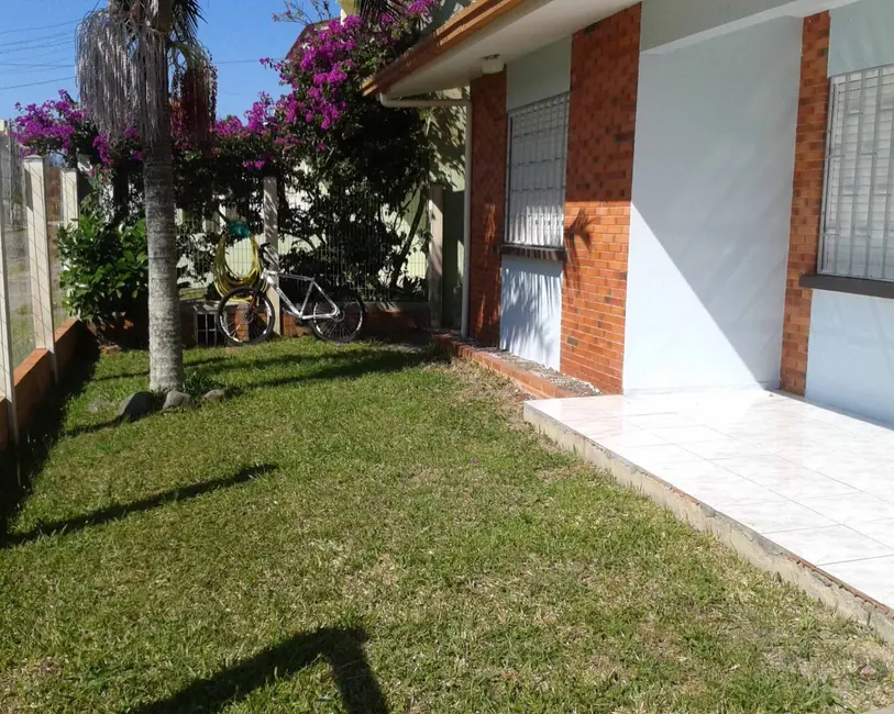Foto 1 de Casa com 3 quartos à venda, 67m2 em Capao Da Canoa - RS