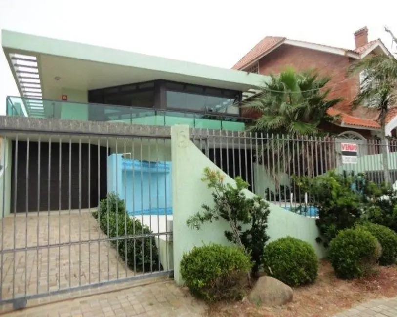 Foto 1 de Casa com 4 quartos à venda, 67m2 em Capao Da Canoa - RS